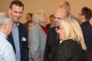 members of the Growth Community chatting and networking